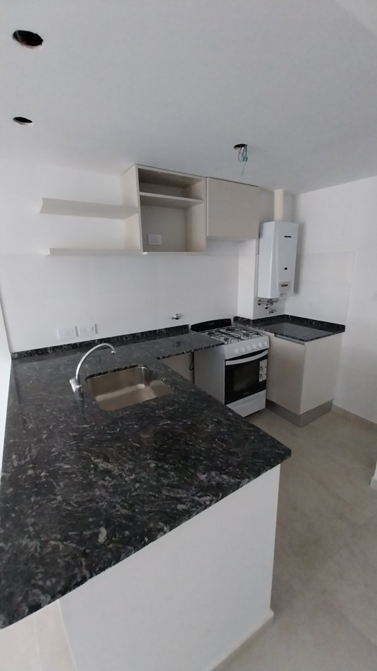 PICHINCHA VENTA DEPARTAMENTO UN DORMITORIO SUIPACHA Y CORDOBA CON TERRAZA EXCLUSIVA